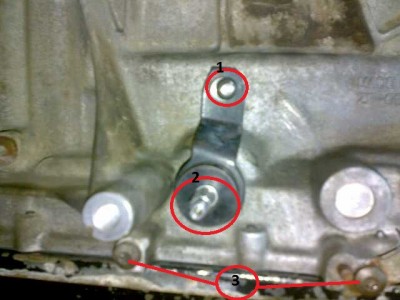 1 - крепление троса<br />2-вал под датчик положения селектора<br />3 - болты крепящие этот датчик (звезда № 27)